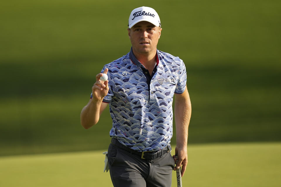 Justin Thomas waves after making a putt on the 10th hole during the second round of the PGA Championship golf tournament at Southern Hills Country Club, Friday, May 20, 2022, in Tulsa, Okla. (AP Photo/Eric Gay)