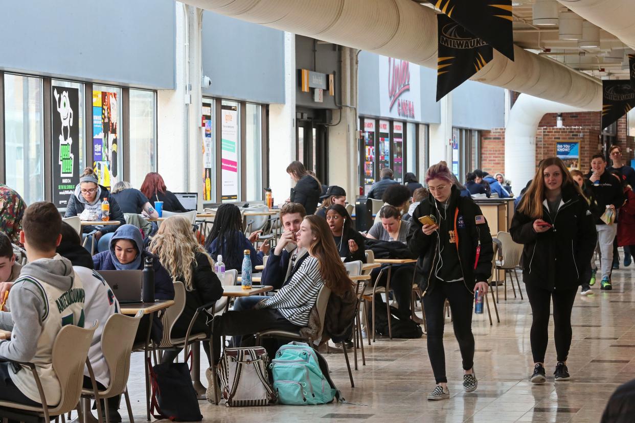 Students socialize, study and have lunch in the student union at the University of Wisconsin-Milwaukee. The university is one of many that has struggled with enrollment declines as it works to serve its students, many of whom come from low-income households.