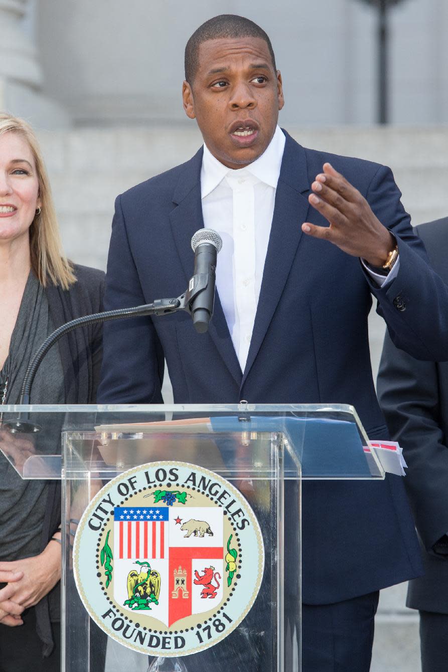 Jay-Z Carter, also known as Shawn carter, announces the Made in America Festival during a news conference at City Hall on Wednesday, April 16, 2014 in Los Angeles. The music mogul was joined by the city’s mayor Wednesday at Los Angeles City Hall to announce the two-day concert, which is planned for Labor Day weekend. (Photo by Paul A. Hebert/Invision/AP)