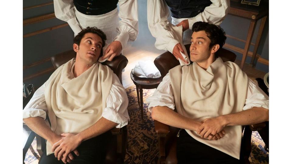 Jonathan Bailey as Anthony Bridgerton and Luke Thompson as Benedict Bridgerton 