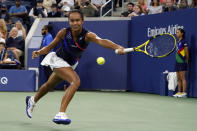 Leylah Fernandez, of Canada, returns to Angelique Kerber, of Germany, during the fourth round of the US Open tennis championships, Sunday, Sept. 5, 2021, in New York. (AP Photo/John Minchillo)