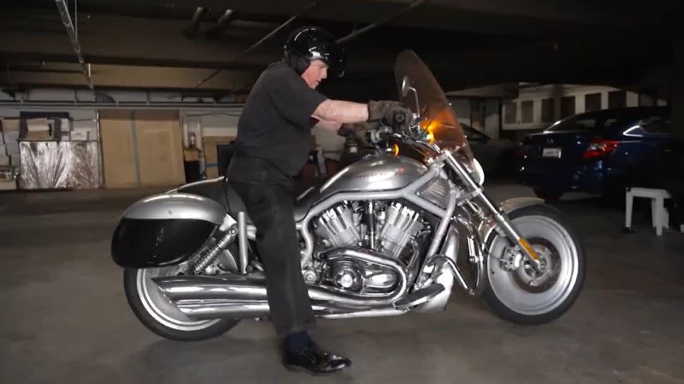 Monsignor Frank Hicks of the Los Angeles Police Department Chaplain Corps on his 2002 Harley Davidson V-Rod motorcycle. - CNN