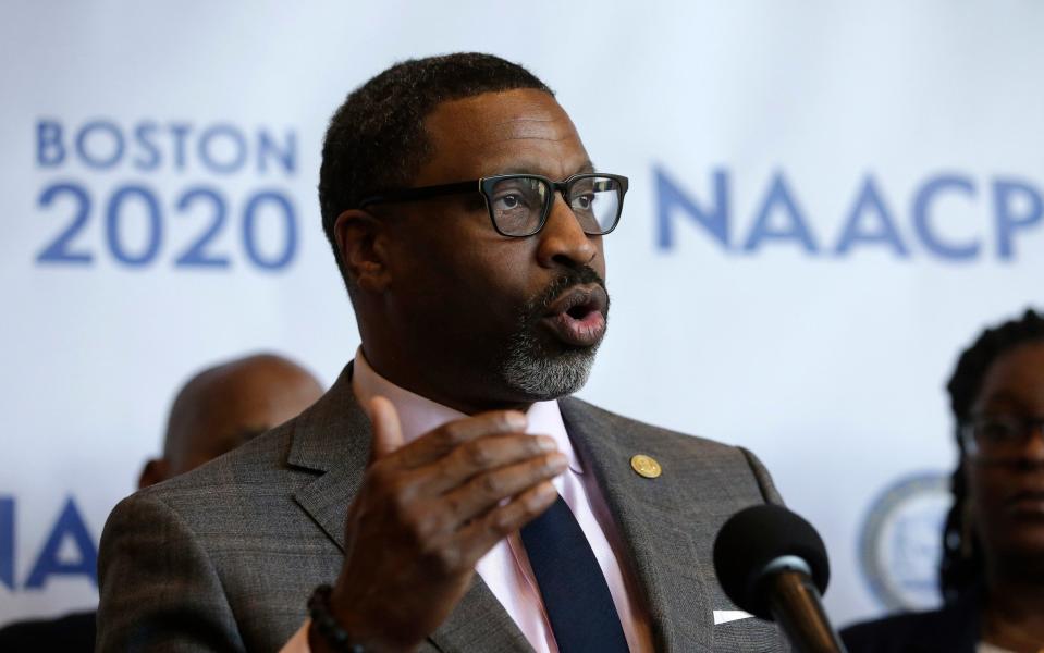 In this Thursday, Dec. 12, 2019, file photo, National Association for the Advancement of Colored People President Derrick Johnson faces reporters during a news conference in Boston - Steven Senne/AP