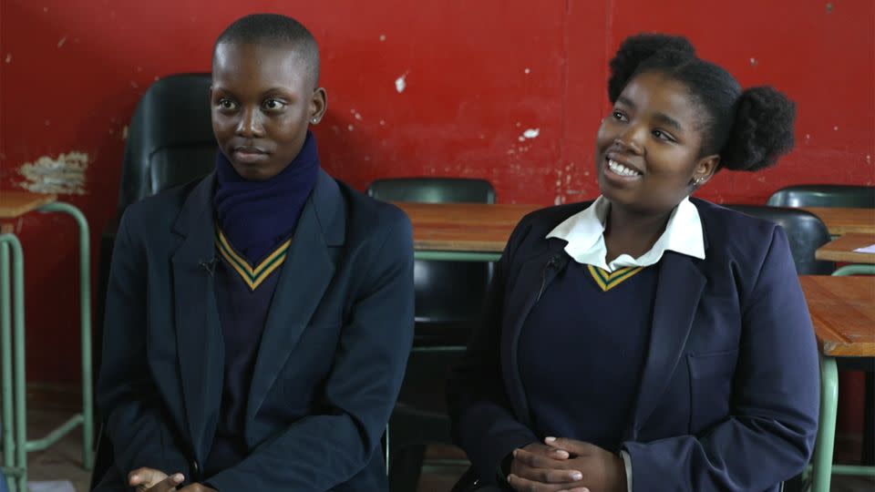 Students Atlegang Alcock (left) and Mbali Msimanga (right) are proud of their school’s history in the Soweto youth uprising. - CNN