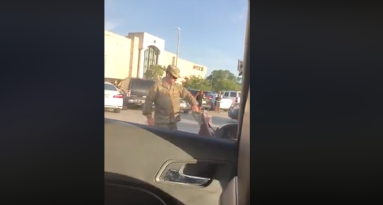 A Fort Stewart soldier is in military police custody after an outburst in a mall parking lot was captured on camera and shared on Facebook. (Photo: Facebook)