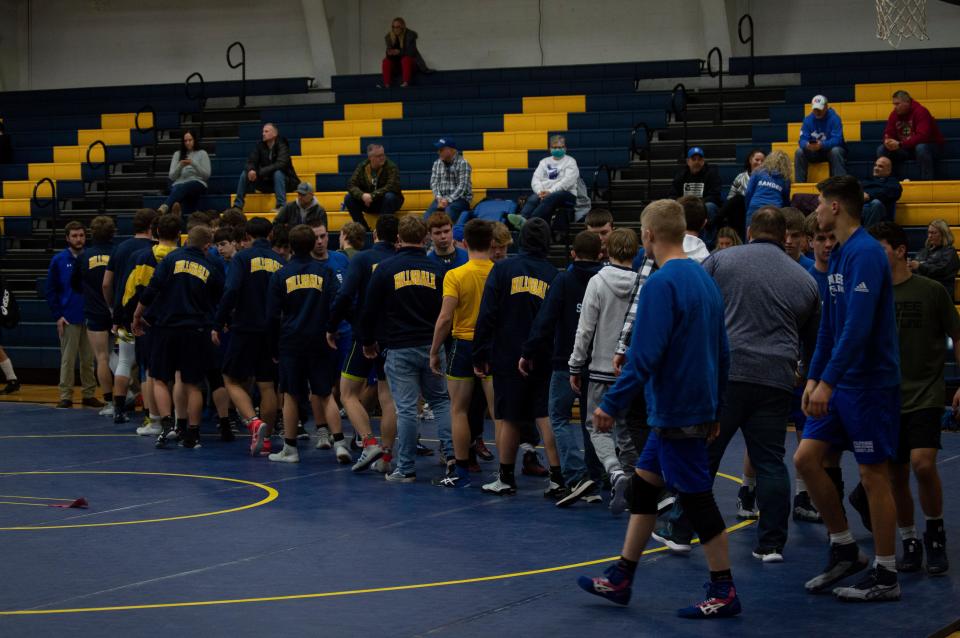 Hillsdale and Dundee shake hands after a hard fought match.