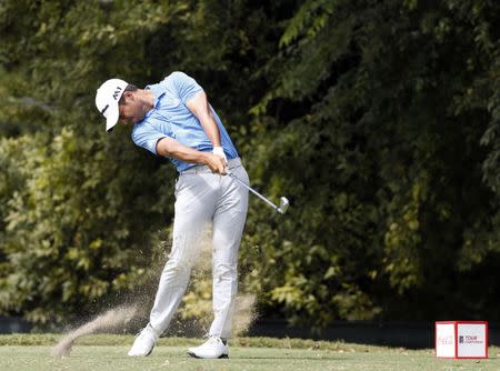 Sep 24, 2017; Atlanta, GA, USA; Xander Schauffele plays his shot from the second tee during the final round of the Tour Championship golf tournament at East Lake Golf Club. Mandatory Credit: Brett Davis-USA TODAY Sports