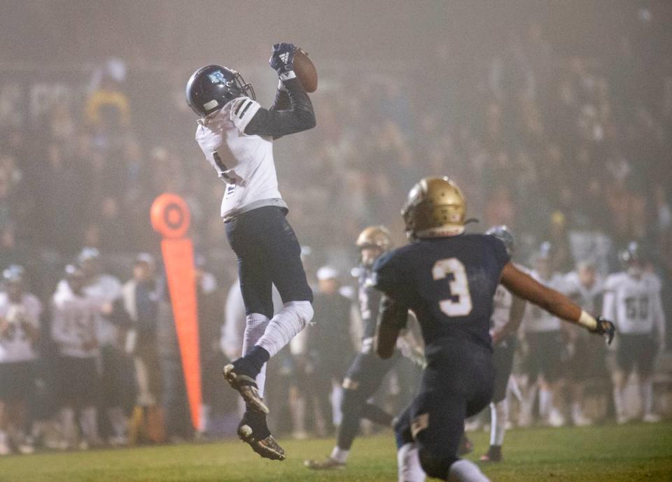 Bullard’s Wendell Ware makes a catch and run for a touchdown in the fourth quarter of the CIF Division II Northern California Regional Championship game at Central Catholic High School in Modesto, Calif., Dec. 3, 2021.