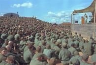 <p>Billy Graham addresses a crowd of more than 5,000 U.S. troops at Long Binh, Vietnam, Dec. 23, 1966. (Photo: AP) </p>