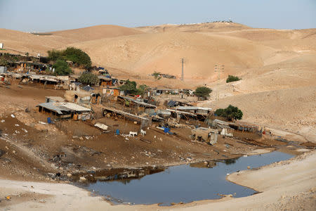 A wastewater pond is seen in the Palestinian Bedouin village of Khan al-Ahmar that Israel plans to demolish, in the occupied West Bank October 2, 2018. REUTERS/Mohamad Torokman