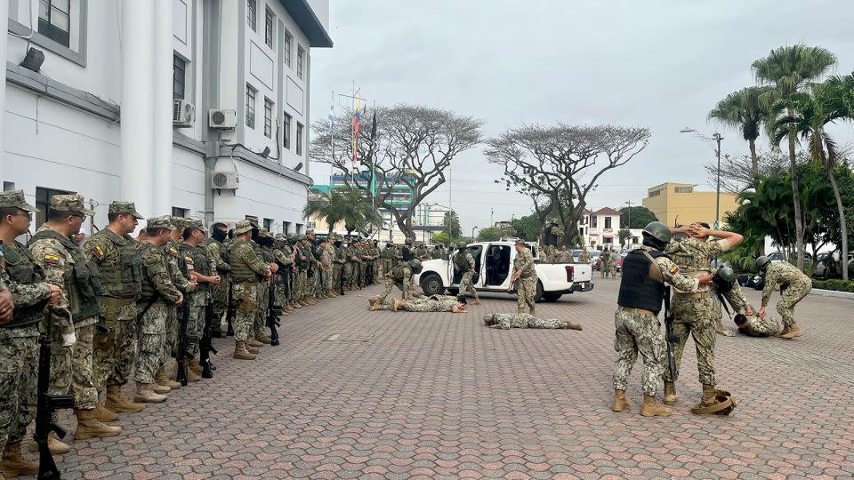 Soldiers take part in drills before they head out on operations in Guayaquil. - Sean Walker/CNN