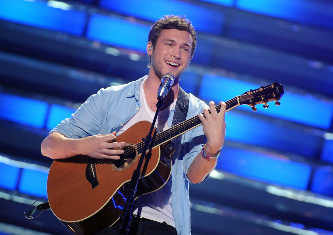 Phillip Phillips performs onstage at part 1 of FOX's "American Idol" Season 11 finale performance show on May 22, 2012 in Hollywood.<p>American Idol 2012/Getty Images</p>