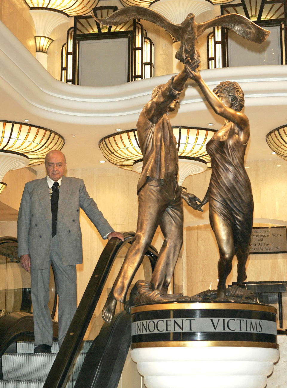 Mohamed Al Fayed Unveils A Statue Of Diana, Princess Of Wales & Dodi Al Fayed At The Harrods Store In London. The 10Ft Bronze Memorial Is Entitled Innocent Victims. . (Photo by Mark Cuthbert/UK Press via Getty Images)