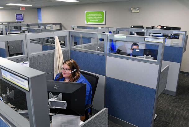 PHOTO: Helpline Center employees take calls in Sioux Falls, S.D., July 13, 2022. (Erin Woodiel/Argus Leader via USA Today Network)