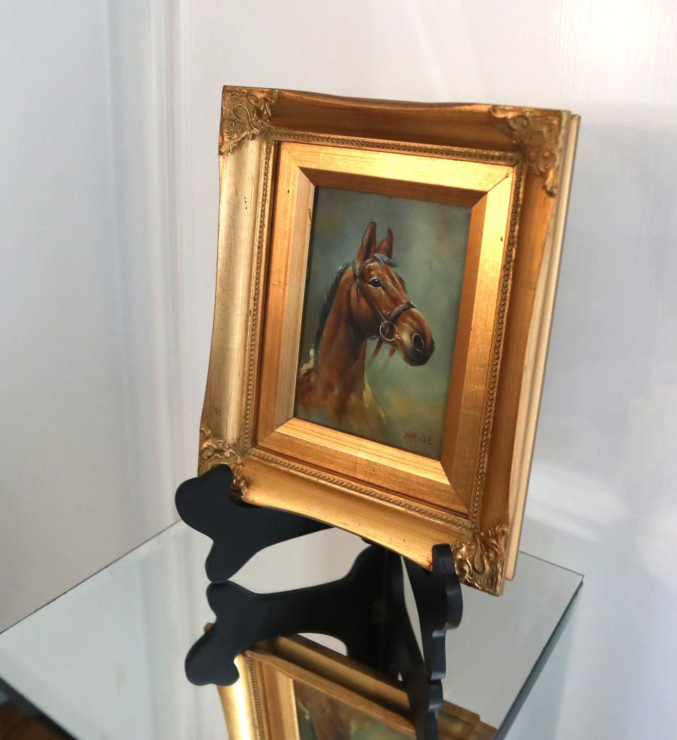 A portrait of a horse in the family room on the first floor of the home in Prospect  that was built in 2002.   02/10/23