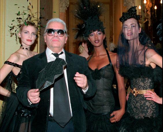 In trademark uniform after Chanel’s 1996 Paris show (AP)