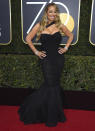 <p>Wie immer wunderbar drüber war Mariah Careys Fishtail-Dress mit Quetsch-Dekolleté von Dolce & Gabbana. Ach, Mariah … (Bild: AP) </p>