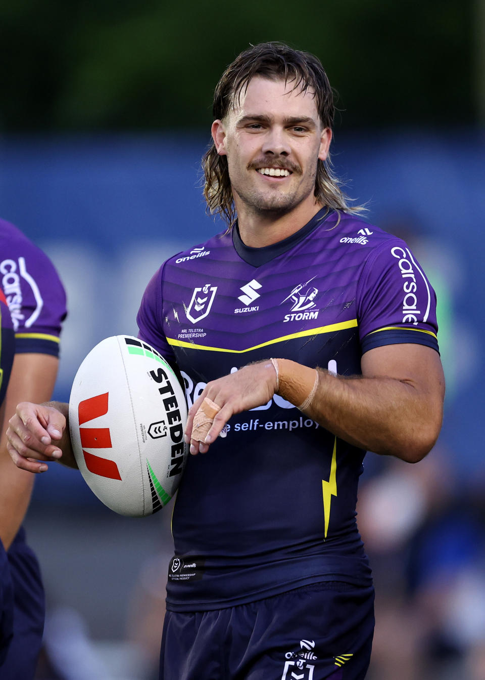 Ryan Papenhuyzen smiles during a game.