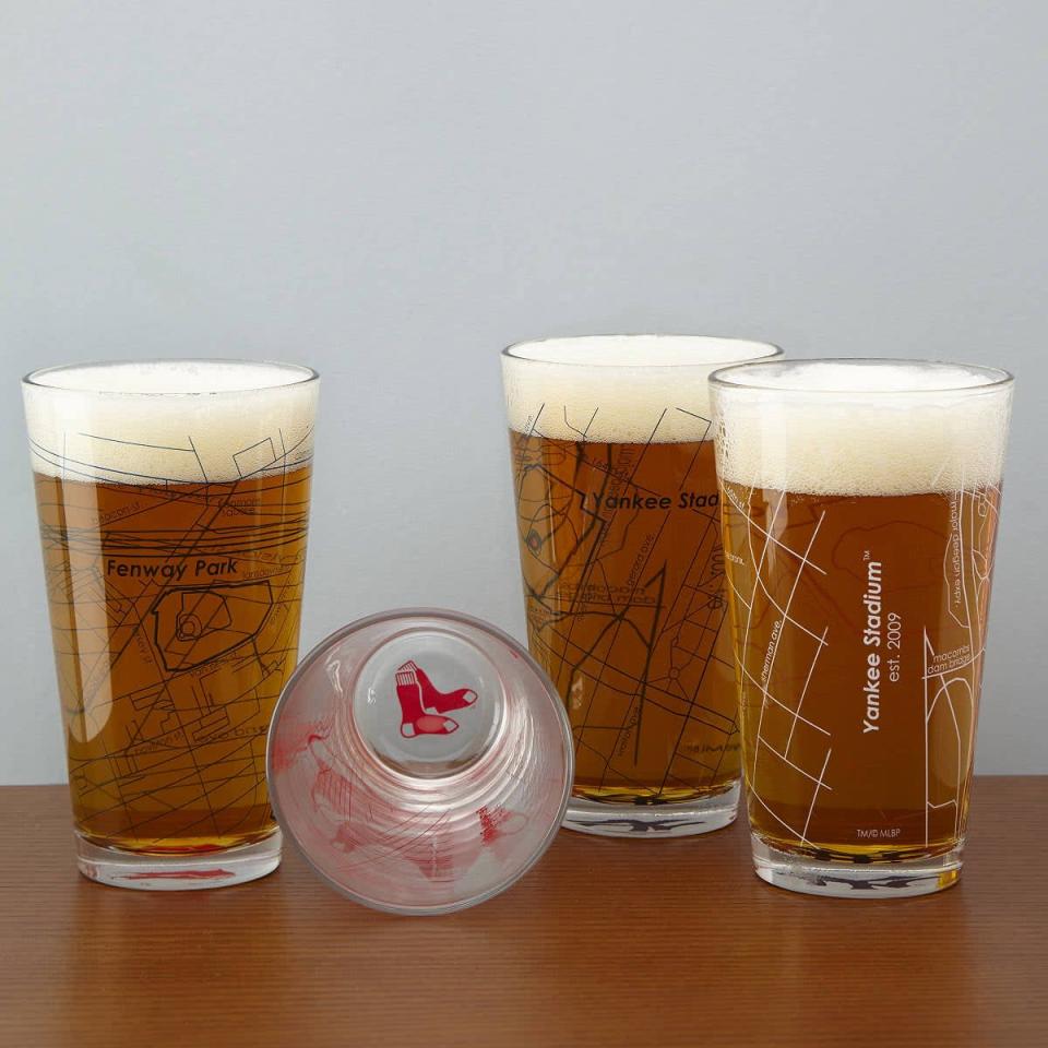 <p>They'll love these <span>Baseball Park Map Pint Glasses</span> ($38) with their favorite team on them. It comes in over 20 team options.</p>