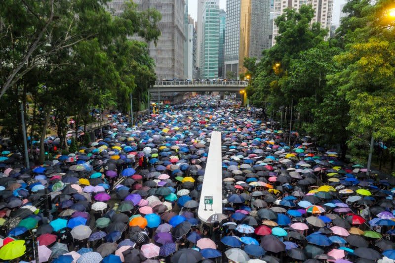 A massive crowd of protesters under umbrellas leave an anti-government rally in Hong Kong's Victoria Park on August 18, 2019. Organizers estimated 1.7 million people turned out for the demonstration. File Photo by Thomas Maresca/UPI