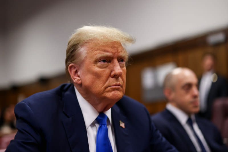 Former President Donald Trump sits in court for his criminal trial at Manhattan Criminal Court in New York as opening statements are set to begin on Monday on charges Trump allegedly falsified business records to cover up a sex scandal during the 2016 campaign. Pool photo by Brendan McDermid/UPI