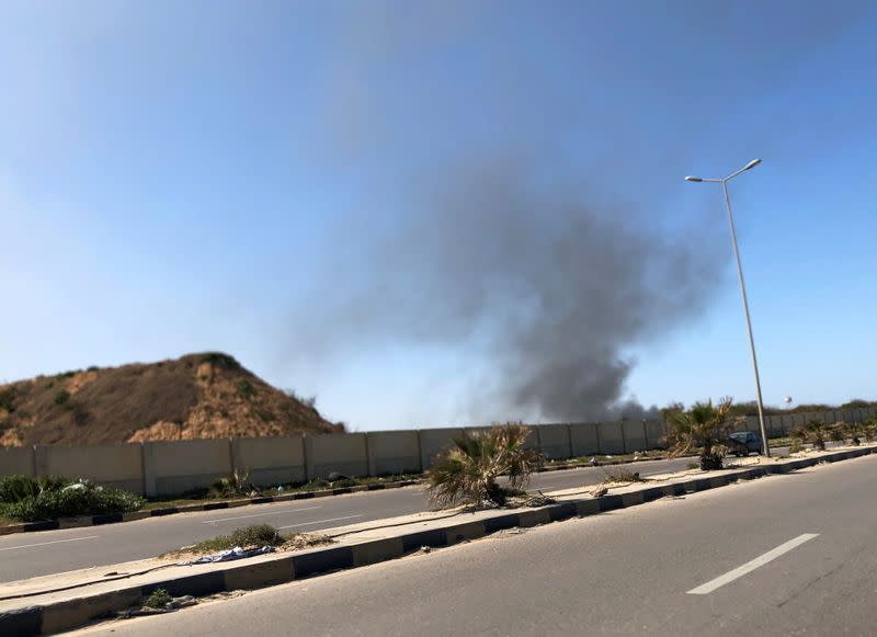 Smoke rises from Mitiga Airport after being attacked in Tripoli