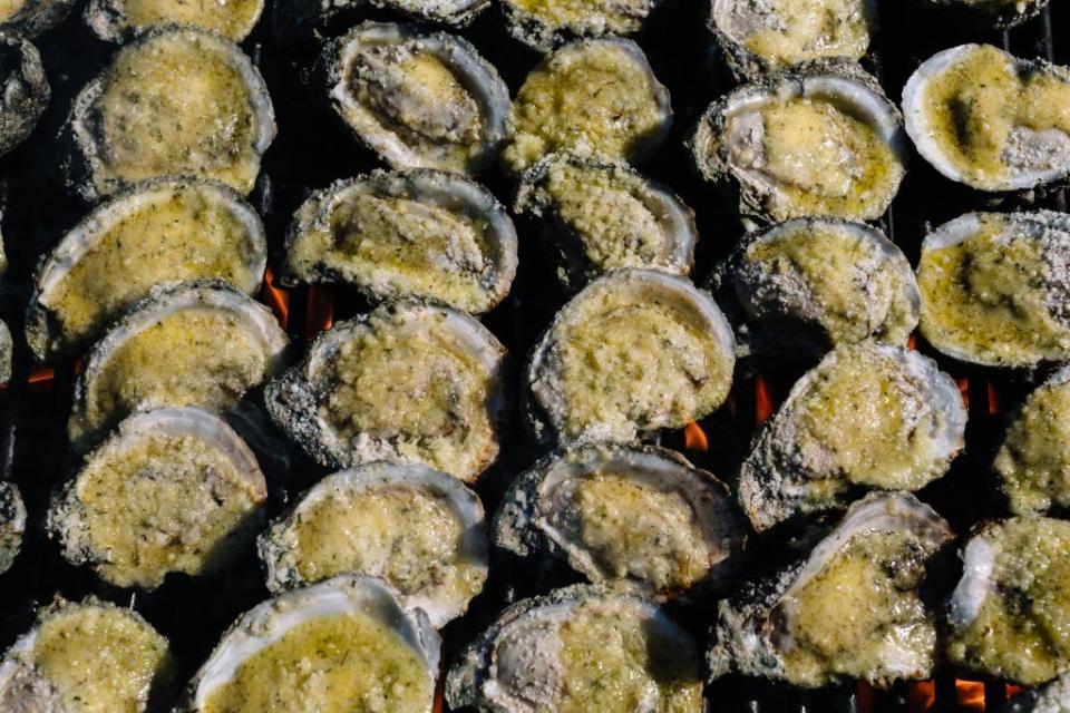new orleans, la april 30, 2020 charbroiled oysters are prepared in the parking lot of st dominic church by staff from dragos seafood restaurant many local restaurants have resorted to curbside service and orders to go during the stay at home order to prevent the spread of the coronavirus william widmer for the washington post via getty images