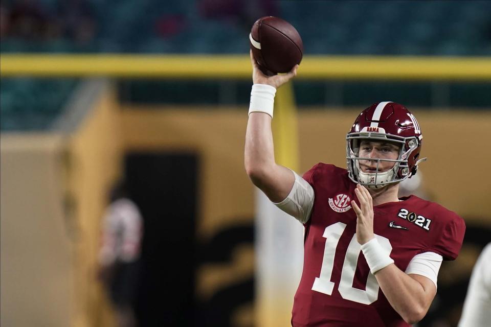 Alabama quarterback Mac Jones warms up before an NCAA College Football Playoff national championship game against Ohio State Monday, Jan. 11, 2021, in Miami Gardens, Fla. (AP Photo/Chris O'Meara)