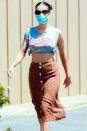 <p>Halsey wears a cropped tee and a summery skirt on her way to spend the day on a yacht with friends in Marina del Rey, California.</p>