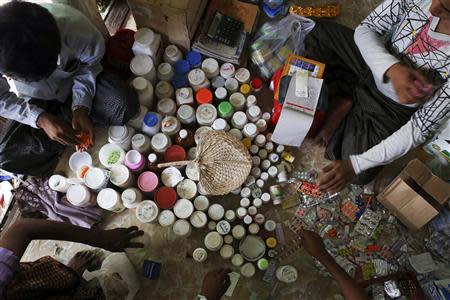 Medicine are seen in a pharmacy which also serves as a makeshift clinic at the Thae Chaung camp for internally displaced people in Sittwe, Rakhine state, April 22, 2014. REUTERS/Minzayar