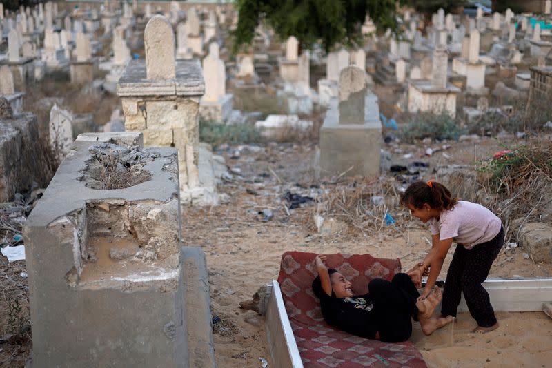 The Wider Image: Gaza struggles to accommodate the living and the dead as population grows