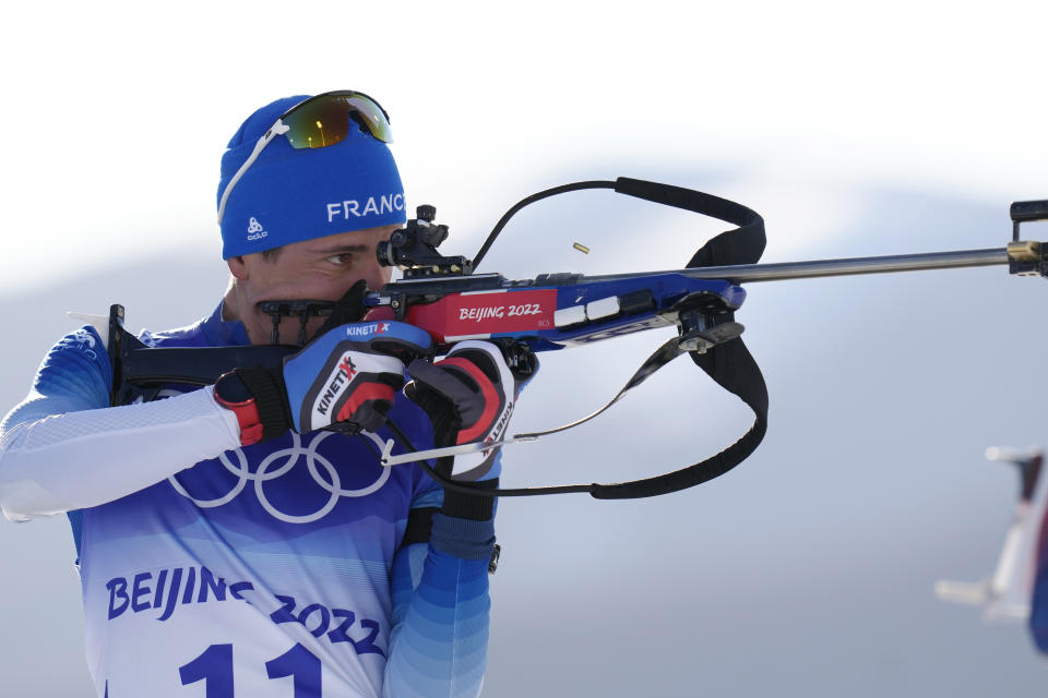 Quentin Fillon Maillet of France shoots during the men's 20-kilometer individual race at the 2022 Winter Olympics, Tuesday, Feb. 8, 2022, in Zhangjiakou, China. (AP Photo/Kirsty Wigglesworth)