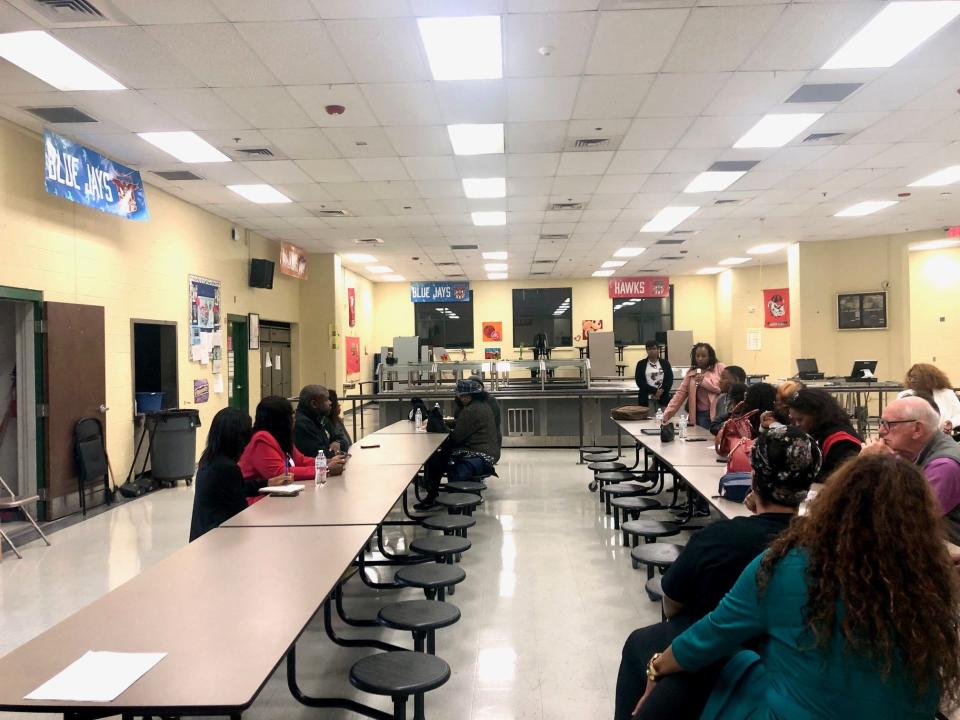 District 1 candidates for the Metro Nashville Public Schools board listen as community members voice ideas and questions at Jere Baxter Middle School on Thursday, Feb. 8, 2024, in Nashville, Tenn.