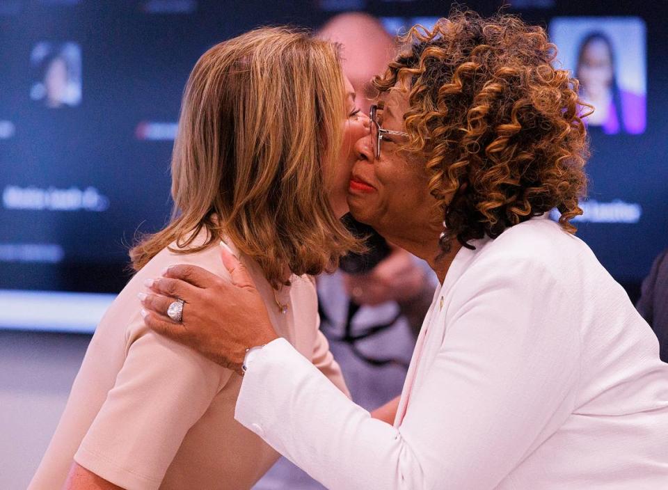 Pearl Burris-Floyd, secretary of the UNC System Board of Governors, hugs Wendy Murphy after Murphy was elected chair of the board during a meeting on Thursday, May 23, 2024, in Raleigh, N.C.