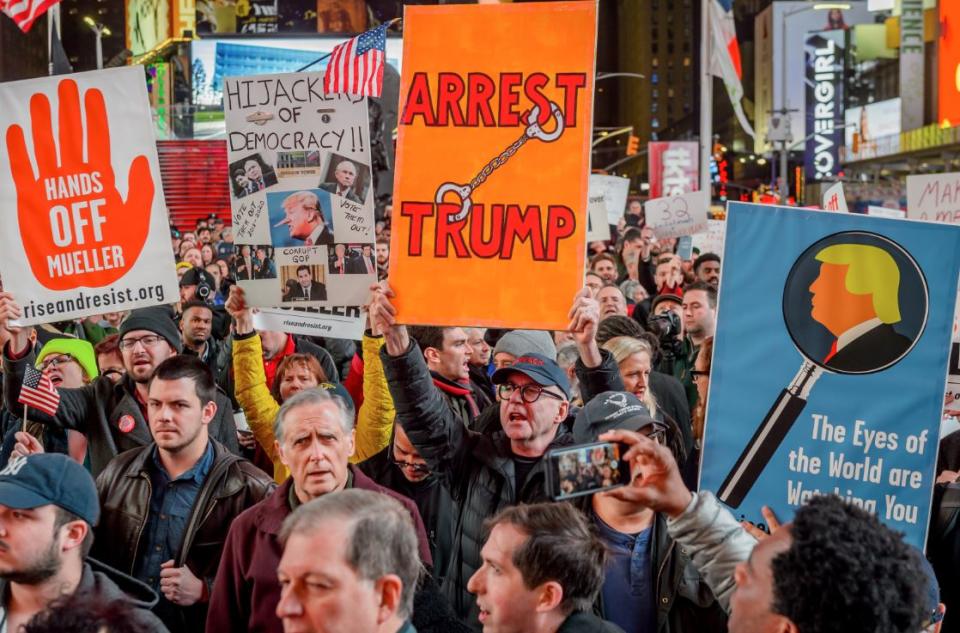 Protesters in New York call for the president to be arrested (PA)