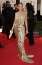 <p>She glittered in a sultry gold gown with a plunging neckline at the Golden Globes. </p>