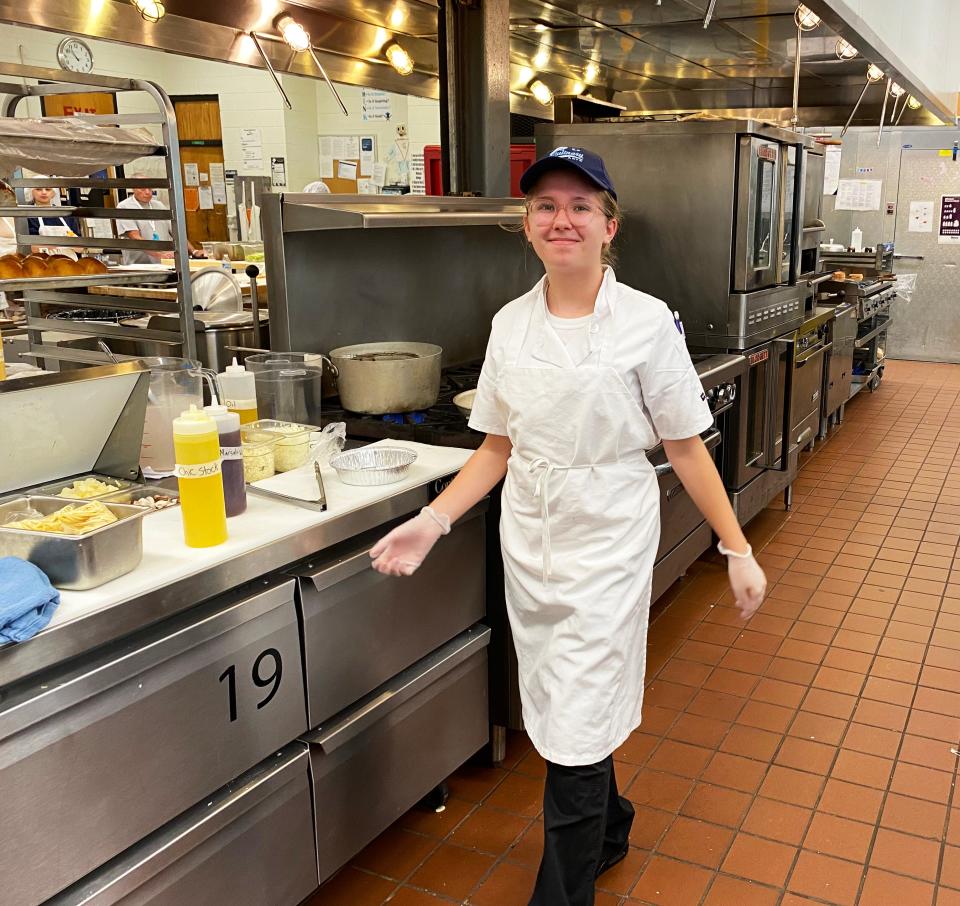 B-P junior Kayla Glynn cooks on the line in the kitchen area for the Silver Platter Restaurant on Oct. 6, 2022.