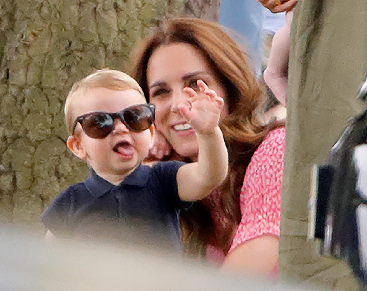 Prince Louis of Cambridge and Catherine, Duchess of Cambridge attend the King Power Royal Charity Polo Match, in which Prince William, Duke of Cambridge and Prince Harry, Duke of Sussex were competing for the Khun Vichai Srivaddhanaprabha Memorial Polo Trophy at Billingbear Polo Club on July 10, 2019 in Wokingham, England.