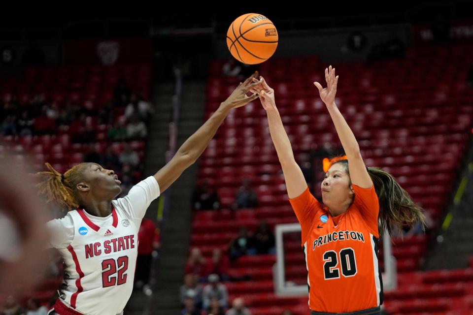 Princeton guard Kaitlyn Chen (20) shoots as North Carolina State guard Saniya Rivers (22) defends during the first half of a first-round college basketball game in the women's NCAA Tournament, Friday, March 17, 2023, in Salt Lake City. (AP Photo/Rick Bowmer)