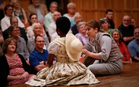 Up close and personal: The audience watch Shunté Lofton and Allie Babich in As You Like It - Credit: Lindsey Walters/American Shakespeare Center