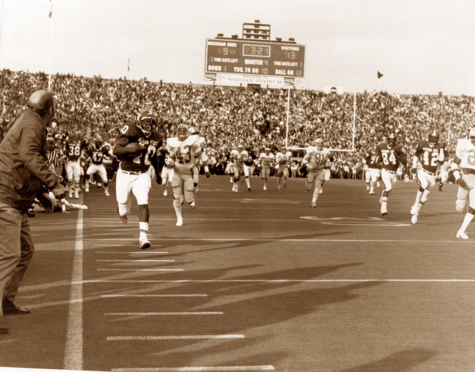 Levi Jackson runs down the sideline at Spartan Stadium on a late 88-yard touchdown run that proved to be the game-winner in a 16-13 upset of Ohio State in 1974.