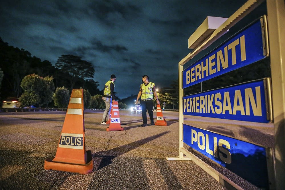 Senior Minister Datuk Seri Ismail Sabri Yaakob says authorities will tighten roadblocks at all district borders starting today and especially on the first day of Hari Raya. ― Picture by Hari Anggara