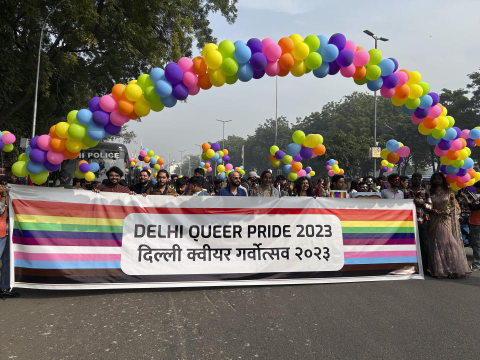 Participants of the Delhi Queer Pride Parade carry a banner during the march in New Delhi, India, Sunday, Nov. 26, 2023. This annual event comes as India's top court refused to legalize same-sex marriages in an October ruling that disappointed campaigners for LGBTQ+ rights in the world's most populous country. (AP Photo/Shonal Ganguly)