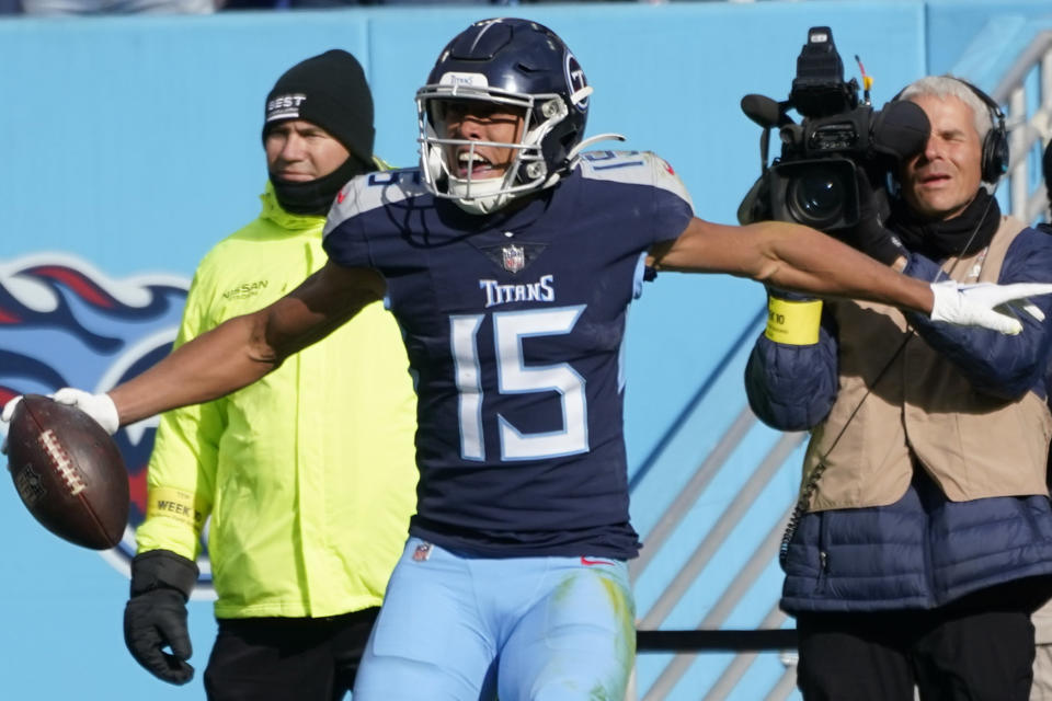 Tennessee Titans wide receiver Nick Westbrook-Ikhine (15) celebrates his touchdown during the first half of an NFL football game against the Denver Broncos, Sunday, Nov. 13, 2022, in Nashville, Tenn. (AP Photo/Mark Humphrey)