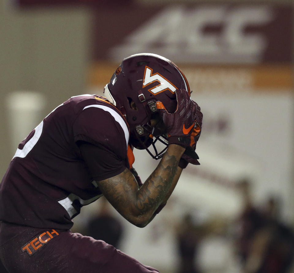 Virginia Tech defensive back Jovonn Quillen reacts after missing an interception opportunity during the first half of an NCAA college football game against Notre Dame on Saturday, Oct. 6, 2018, in Blacksburg, Va. (Matt Gentry/The Roanoke Times via AP)