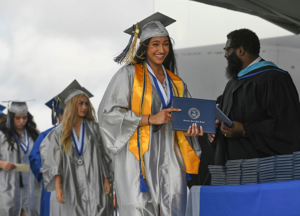 Students and faculty participate in the Sebastian River High School 2022 commencement ceremony on Saturday, May 21, 2022, inside Shark Stadium, in Sebastian. “It’s an awesome experience to see the students graduating, to celebrate with them all of the years of hard work, 13 years have been culminated today" said Sebastian River Principal Christopher Cummings. 