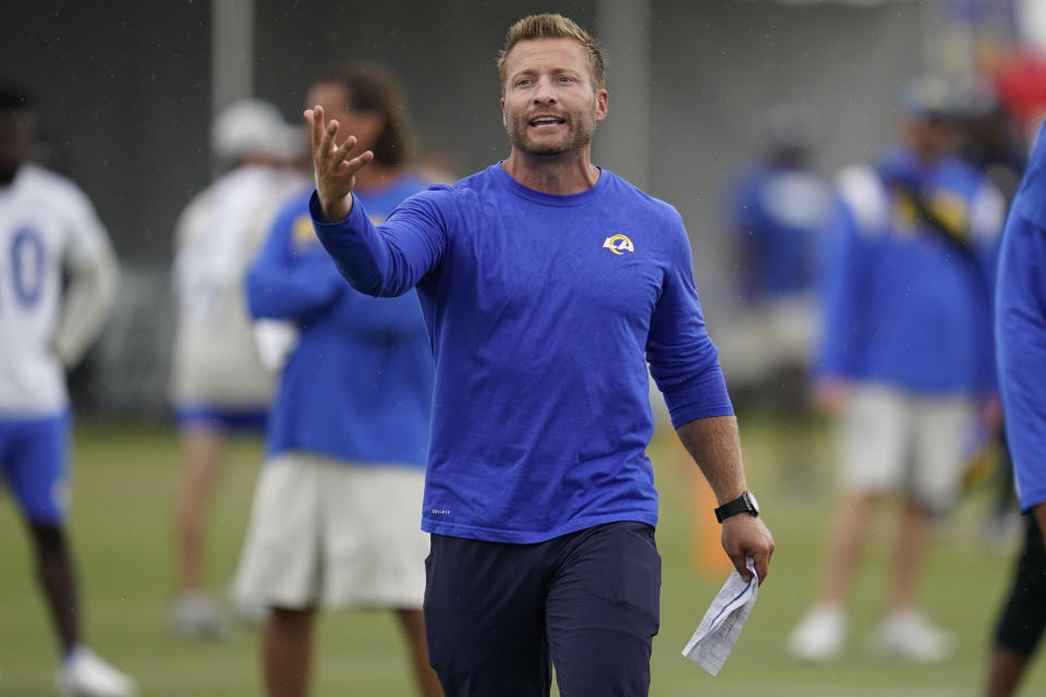 Los Angeles Rams head coach Sean McVay participates in drills at the NFL football team's practice facility in Irvine, Calif. Sunday, July 31, 2022. (AP Photo/Ashley Landis)