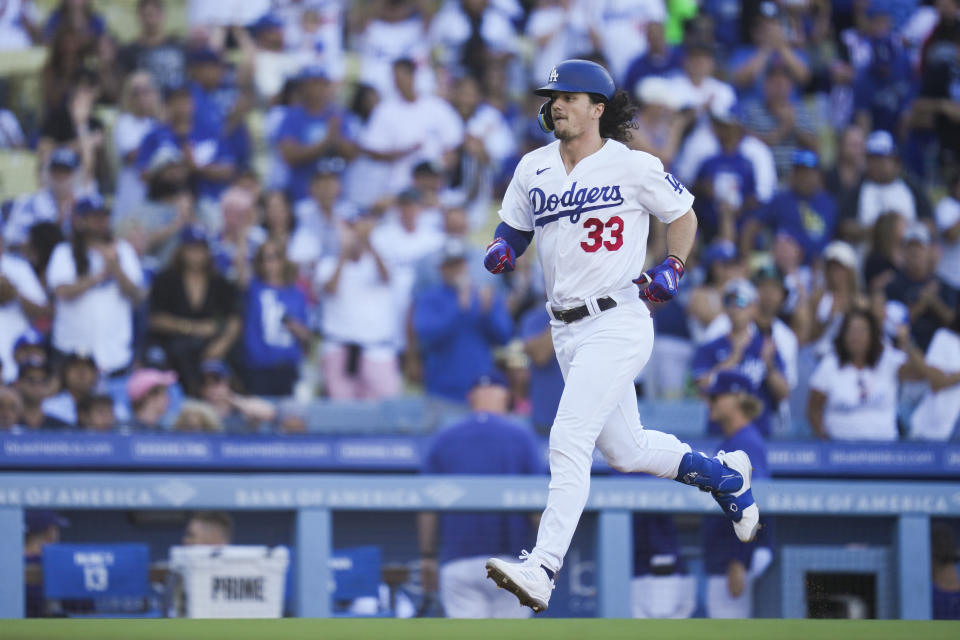 Los Angeles Dodgers' James Outman (33) runs the bases after hitting a home run during the second inning of a baseball game against the San Francisco Giants in Los Angeles, Sunday, Sept. 24, 2023. J.D. Martinez also scored. (AP Photo/Ashley Landis)