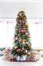 <p>For a set up that looks straight out of nature, adorn your tree with faux or fresh florals. Make it fun with a rainbow array, or keep it simple by sticking with two or three shades.</p><p><strong>Get the tutorial at <a href="https://sugarbeecrafts.com/floral-christmas-tree-dream-tree-challenge" rel="nofollow noopener" target="_blank" data-ylk="slk:Sugar Bee Crafts;elm:context_link;itc:0;sec:content-canvas" class="link ">Sugar Bee Crafts</a>.</strong></p><p><strong><a class="link " href="https://www.amazon.com/s/ref=nb_sb_noss_1?url=search-alias%3Daps&field-keywords=artificial+flowers&rh=i%3Aaps%2Ck%3Aartificial+flowers&tag=syn-yahoo-20&ascsubtag=%5Bartid%7C10050.g.1251%5Bsrc%7Cyahoo-us" rel="nofollow noopener" target="_blank" data-ylk="slk:SHOP FAUX FLOWERS;elm:context_link;itc:0;sec:content-canvas">SHOP FAUX FLOWERS</a><br></strong></p>