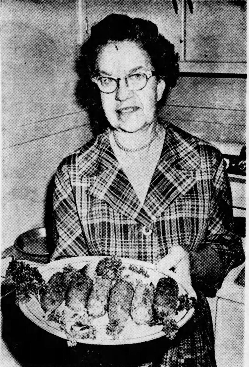 "Mrs. Paul Stokes with nut croquettes. Family recipe makes delicious entree for meatless meals." The recipe was featured in the Oct. 31, 1965, Hoosier Holiday Cookbook.